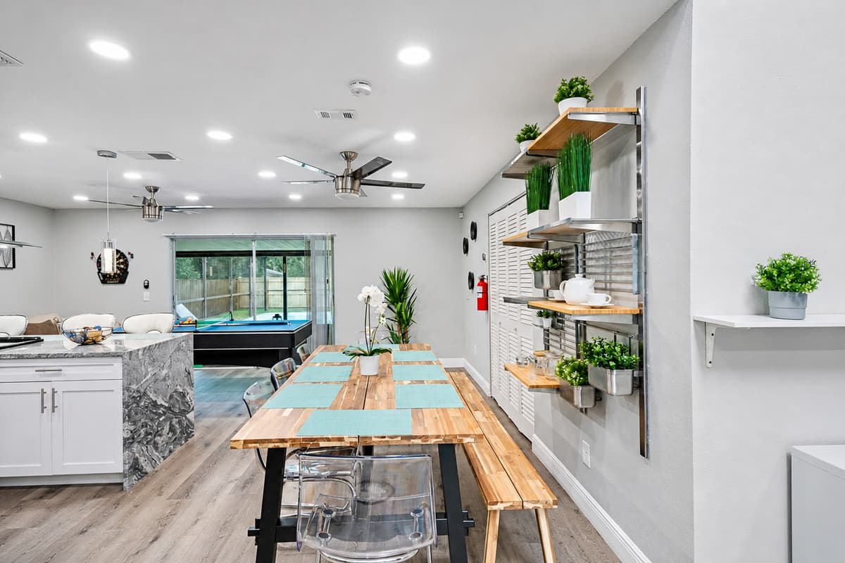 Our Kitchen is an open view of the pool and pool/ping pong table. It is also very accessible to our lovely dining area and the living room. Never miss a story while cooking your favorite meal. Send us an inquiry now!