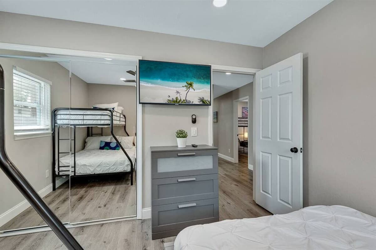 Our wonderful bedroom with a comfortable huge bed, and a bunk bed. This room also has its own TV.  Feel at home in your home away from home. 