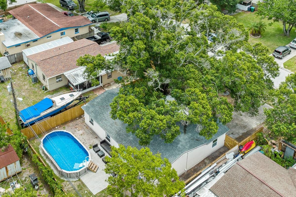 Aerial top view of our incredible house showcasing the beautiful swimming pool!