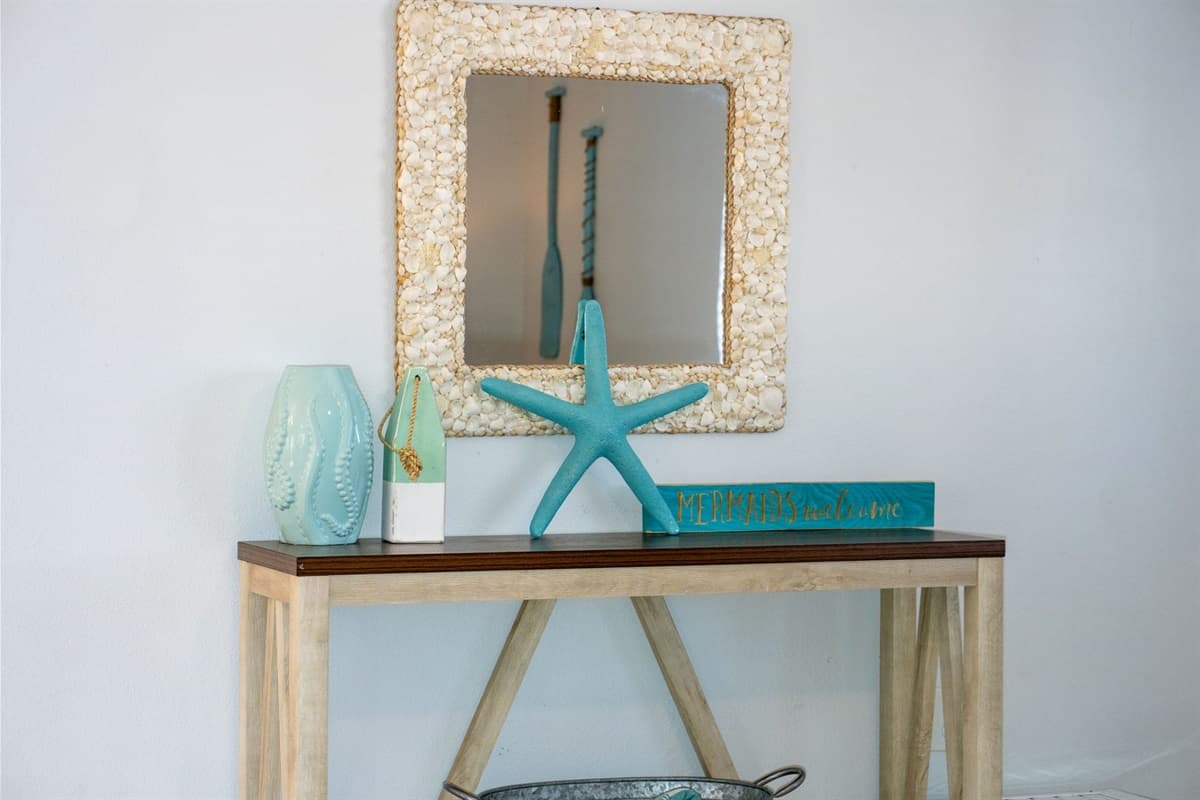 Designed with a soothing, beach-inspired ambiance, this room is perfect for unwinding after a sun-filled day.