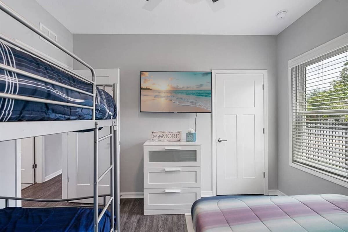 Single bunkbed and a queen size bed for a small family or a group of friends who wants to hang out and sleep in one room. It is very spacious and has a very nice view.