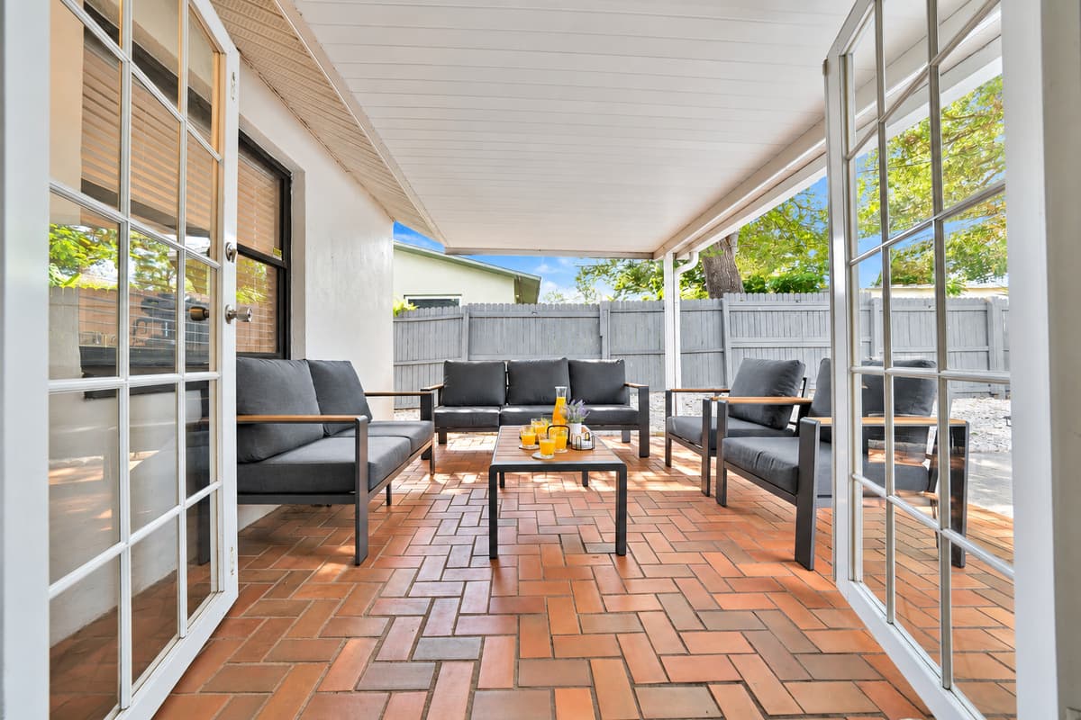 This is the last stop of every single day. Grill cooling down, wet towels over the chairs, drinks on the table and a conversation that runs much longer than anyone planned. Nobody goes back inside in a hurry here.