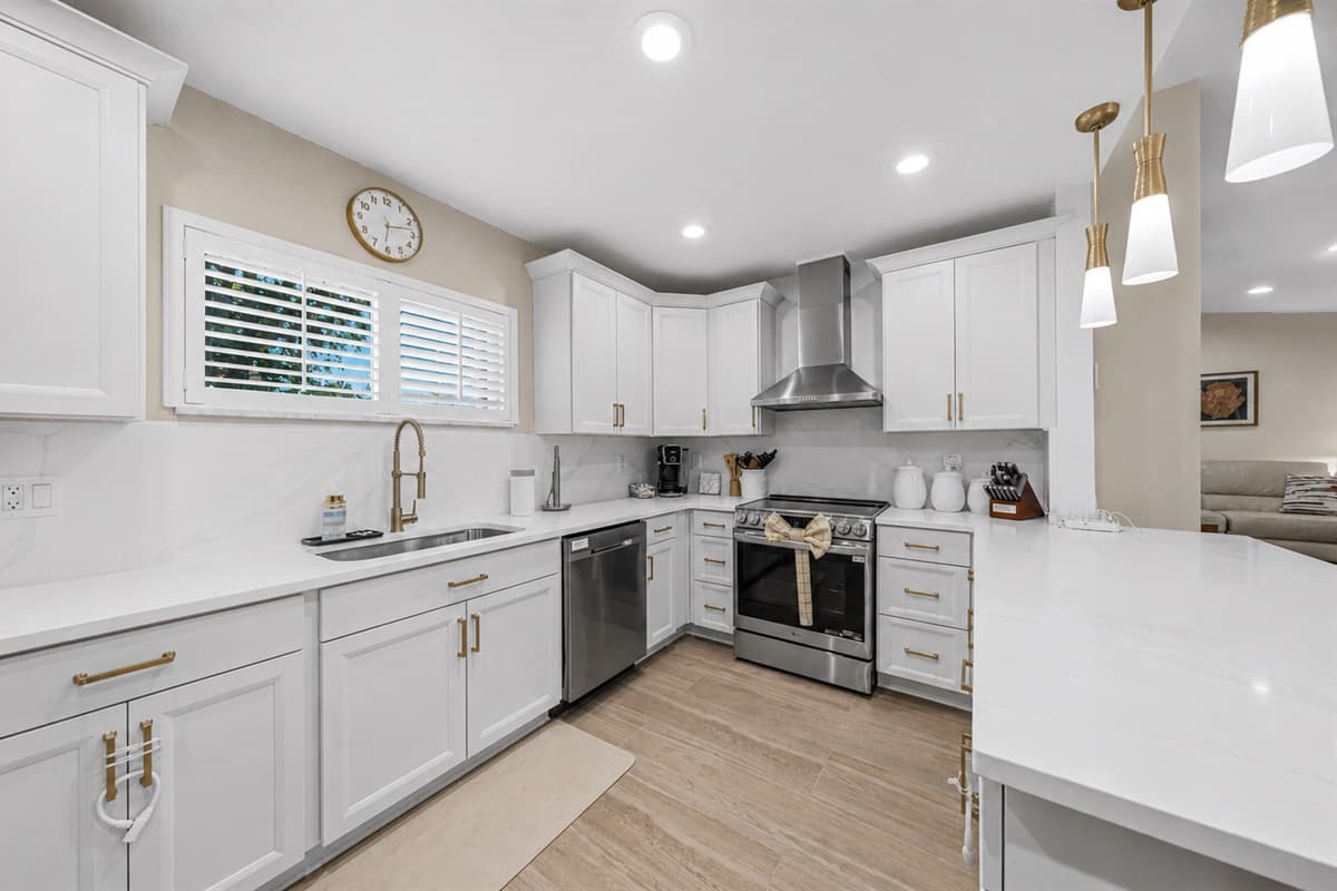 Bright and airy modern kitchen designed with elegant finishes and open-concept functionality.