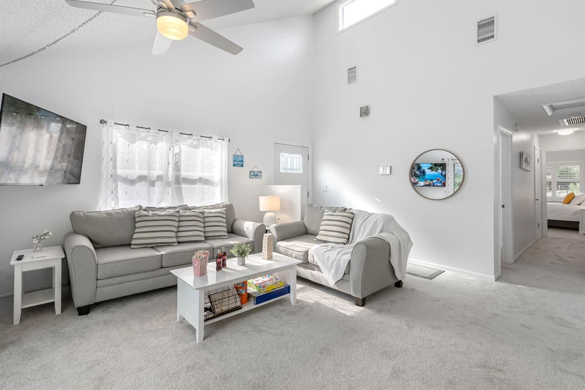 Bright and cheerful, this sun-filled living room invites you to kick back and enjoy a moment of peace.