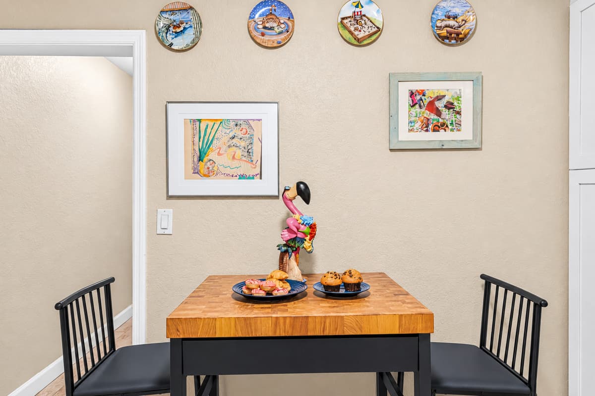 Charming dining nook with tasteful décor—great for intimate meals or morning coffee.