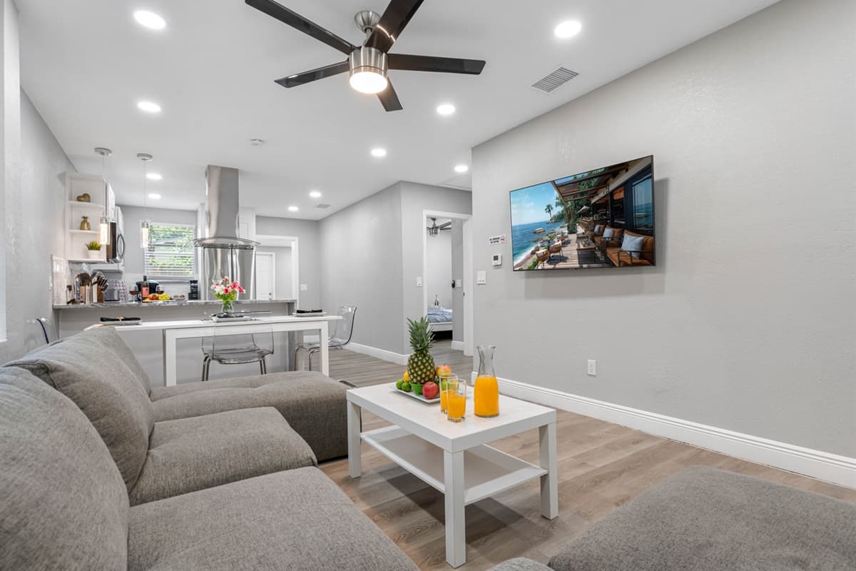 Spacious L-shaped sectional in the living room — plenty of seating for the whole group.