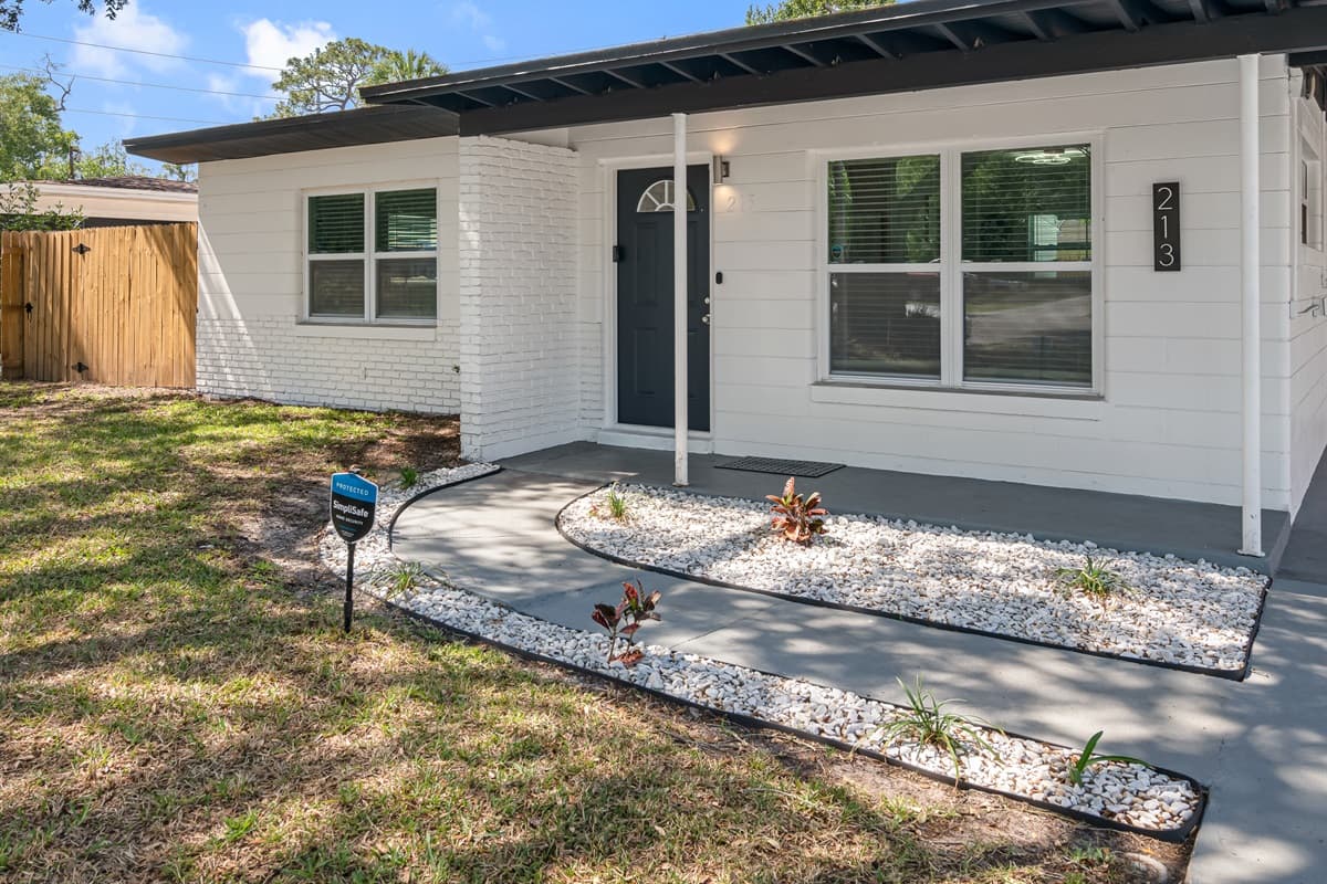 The entrance to our house is more than just a doorway - it's a grand introduction to the luxurious and comfortable living space that awaits you inside.