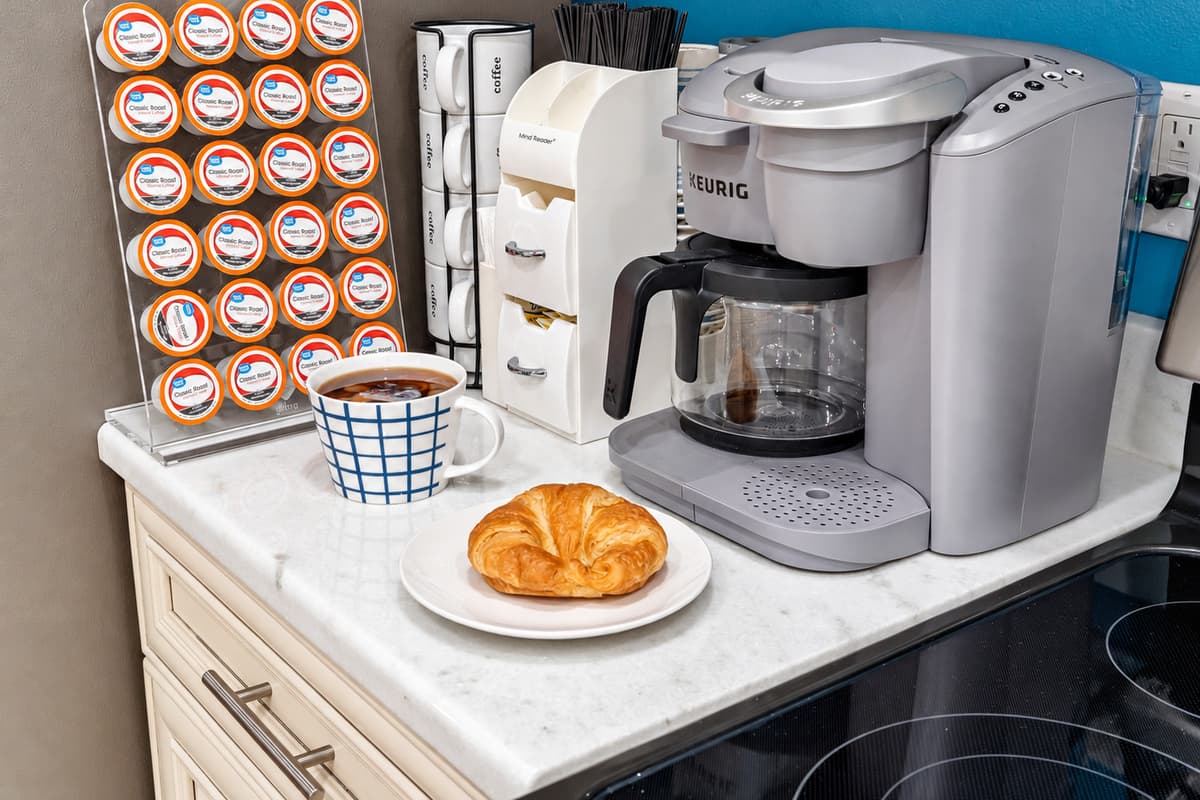 A cozy coffee station is nestled within the kitchen, creating a haven for coffee lovers and aficionados.