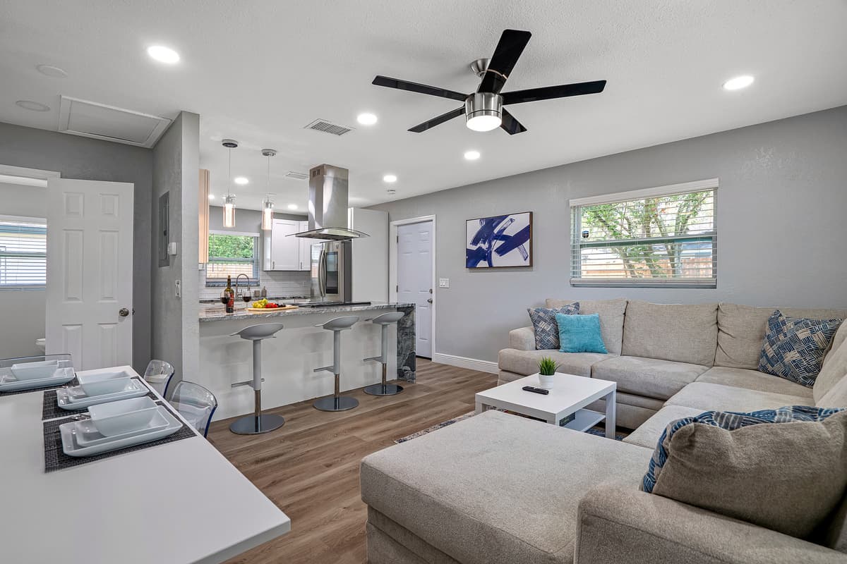 Never miss any story while preparing food for everyone in this open concept! Have an amazing time with family and friends! Send us a message anytime!