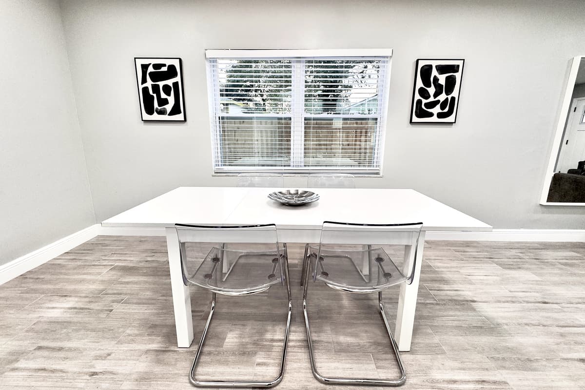 The dining table comfortably seats up to 4 guests, making it the perfect spot to enjoy breakfast, lunch, or dinner with your travel companions.