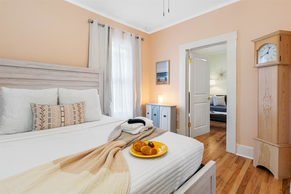 Beyond the cozy bed, this Bedroom is thoughtfully arranged with furniture and decor that add to the serene atmosphere.