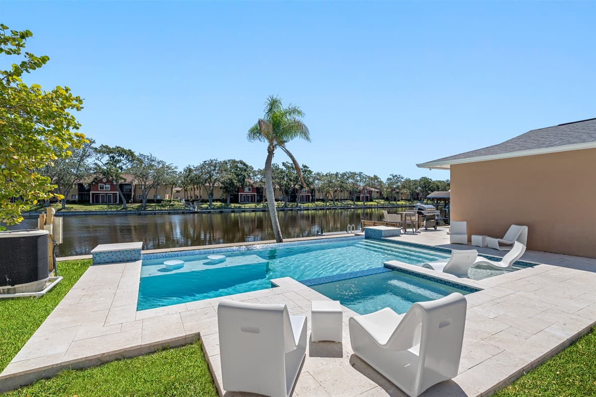 Have the best time of your vacation in this beautiful property with an immaculate heated pool, while enjoying the wonderful view of the lake! If you like what you see, send us an inquiry!