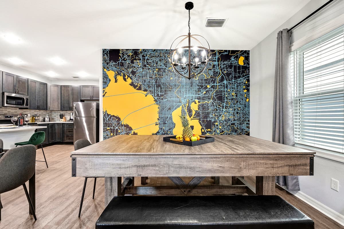 The convertible pool table, with its rich wooden finish and precision craftsmanship, beckons enthusiasts to indulge in a game of billiards.