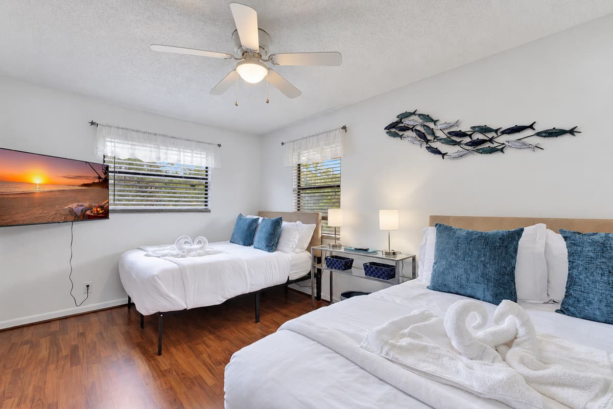 The room's decor is a harmonious blend of modern elegance and cozy charm, with carefully selected furnishings and accents that enhance the overall ambiance.