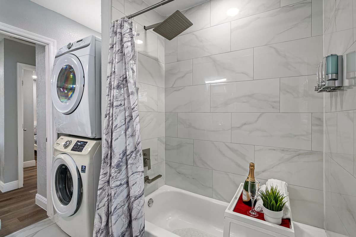 Enjoy a relaxing bath after a long day of travel from your home to your home away from home. Stunning bathroom has his and hers sink, toilet, bathtub and a shower. Send us a message if you have any questions!