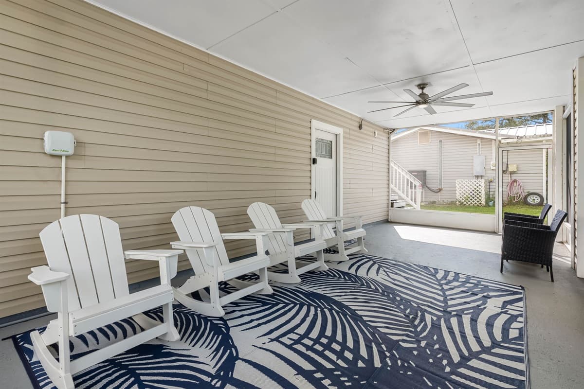 Sit back, sip a cool drink, and enjoy good company in this inviting open-air setting.