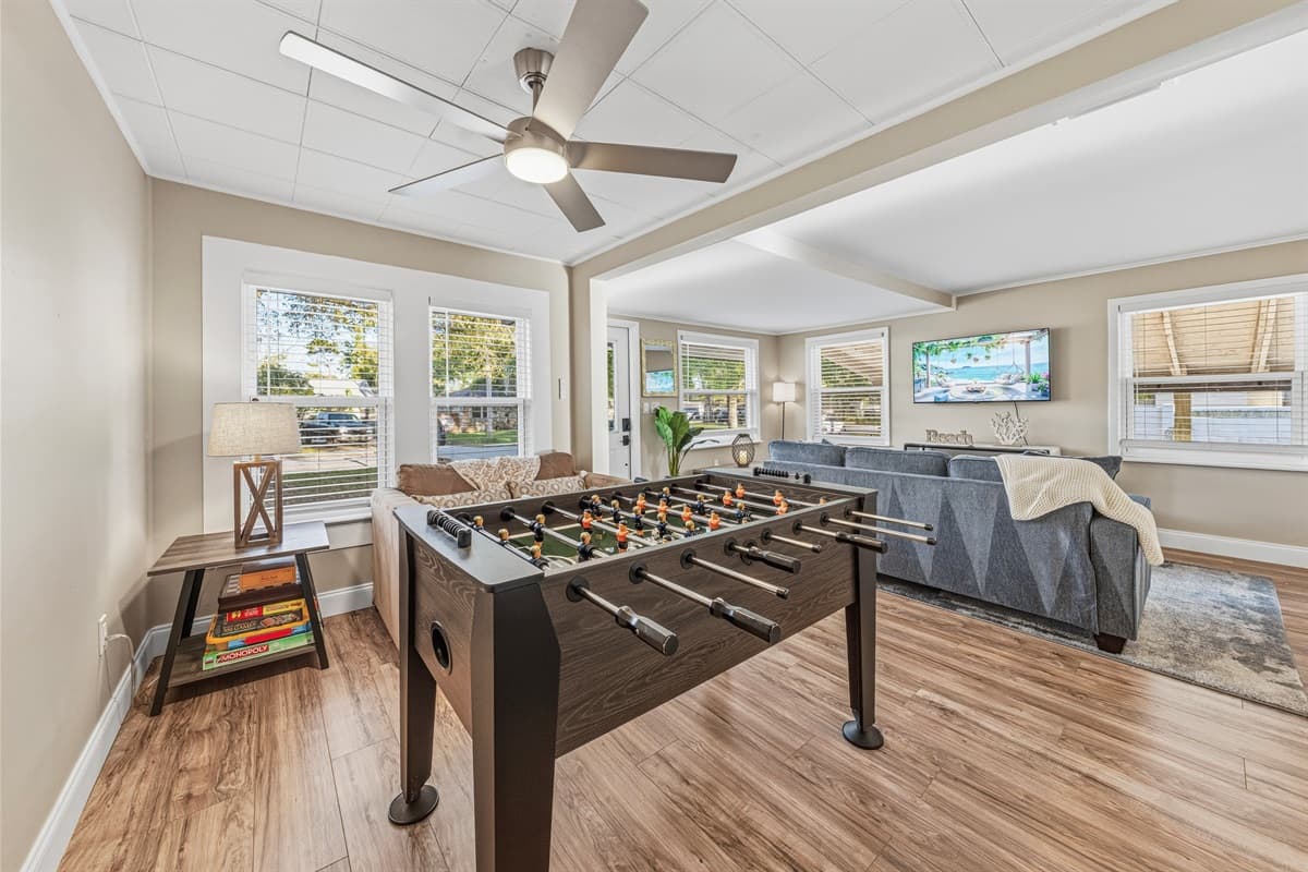 Wide view of the living area showcasing ample space for relaxing and entertaining.