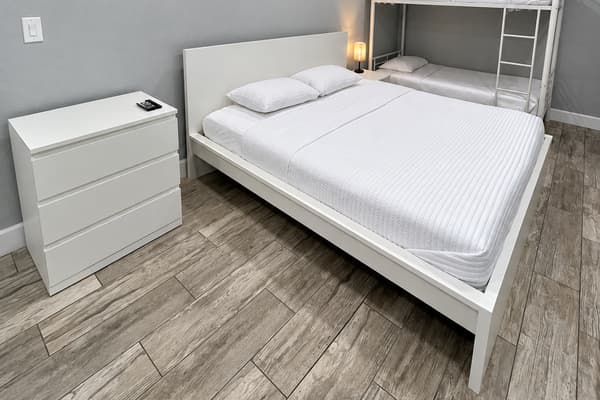 Enjoy a bright and contemporary space equipped with a king bed and a twin bunk bed, ideal for adults and kids alike. *Updated photos will be added soon!