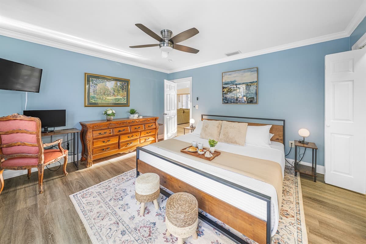 Designed with relaxation in mind, this king bedroom features calming décor and a cozy atmosphere.