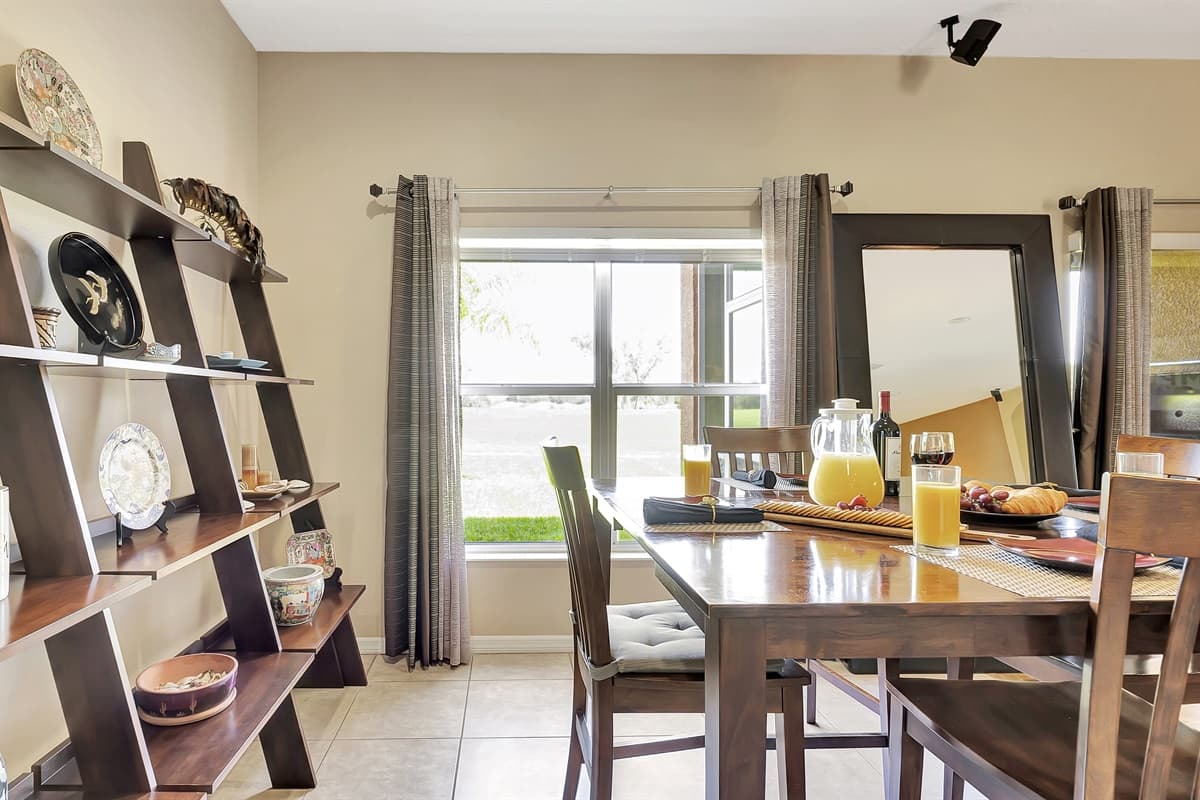 As you savor your culinary creations, bask in the abundant natural light that floods the room, creating an enchanting ambiance for your dining pleasure.