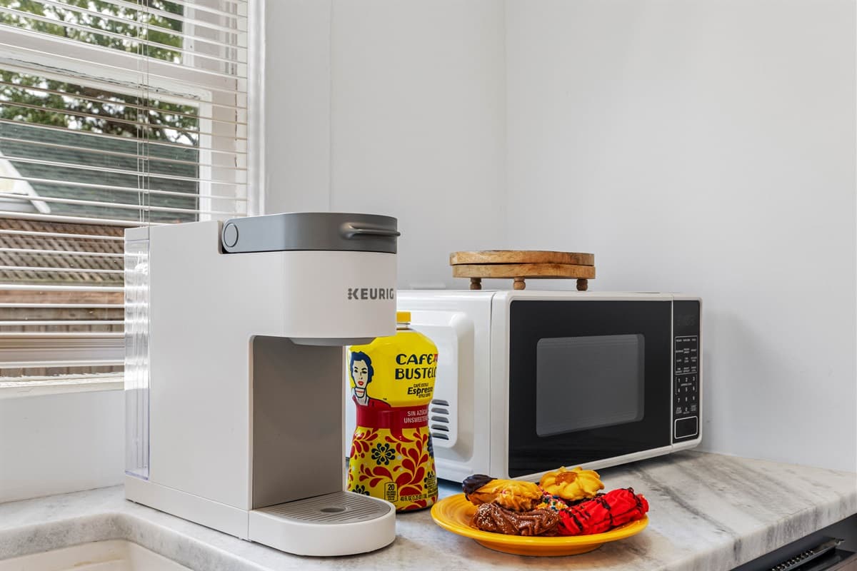 Designed with both style and functionality in mind, the kitchen features clean, modern finishes that enhance its bright and airy feel.