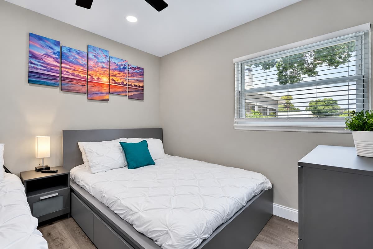 Who wouldn't love this elegant room with queen sized bed, singleover twin bunkbed, drawers for storage and its own TV! If you like what you see, send us a message now!