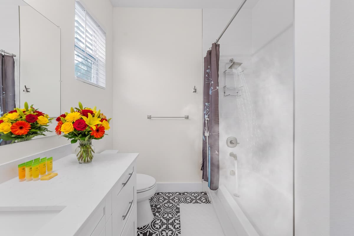 Complimentary toiletries, fluffy towels, and a tub/shower combo — everything you need for a refreshing start or a relaxing end to your day.