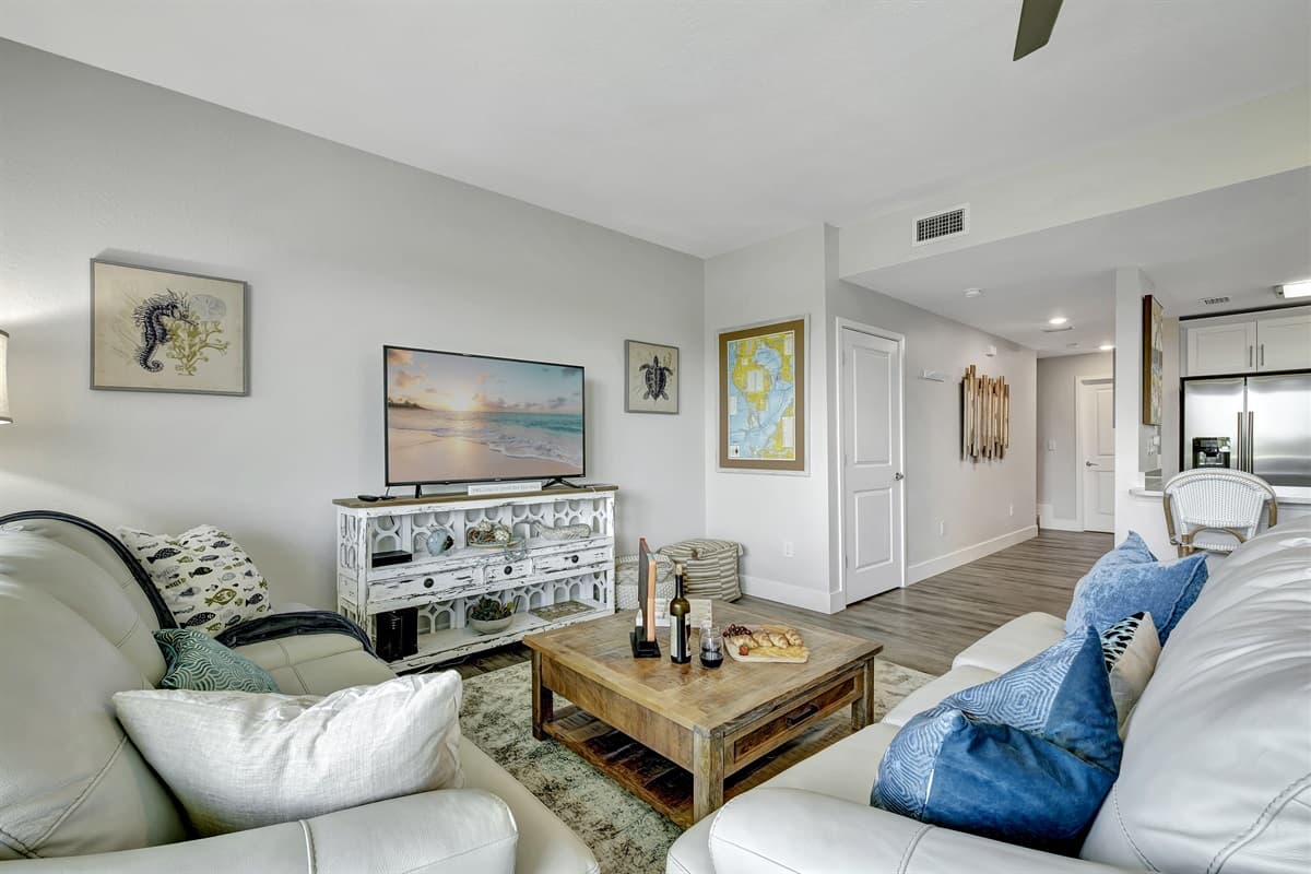 Its cushions seem to have been plumped by the gentlest of breezes, offering a haven of relaxation where you can lose yourself in a good book or share laughter with loved ones.