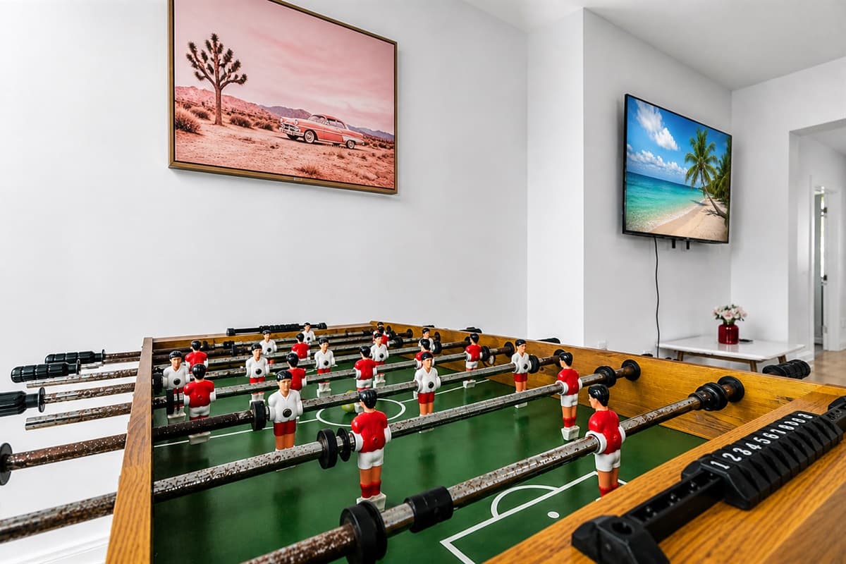 Close-up of the foosball table entertainment area, perfect for family fun and friendly competition.