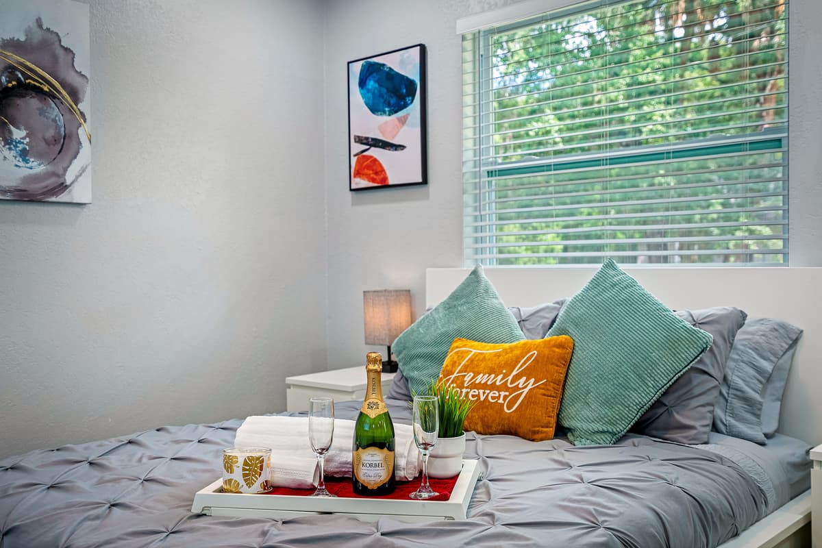 Exquisite bedroom with queen size bed, drawers, full sized mirror closet, and smart TV. Feel comfortable during your stay while making wonderful memories with family and friends. Don't hesitate to send us an inquiry about the property now!