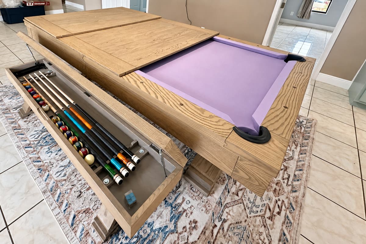 Hidden storage keeps cues and accessories neatly tucked away—perfect for family meals, game nights, and everything in between!