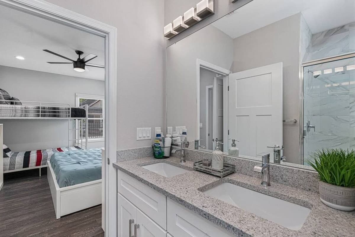 Beautiful bathroom equipped with sink, toilet, and shower. Enjoy a relaxing bath after a long day of travel from your home to your home away from home. If you think this property is for you, send us an inquiry right away!