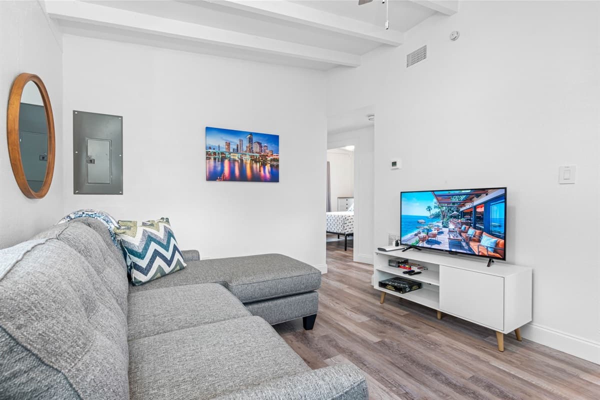 The overall layout of the living area promotes a sense of openness and flow, making it an ideal spot for various activities, from relaxing alone to entertaining guests.