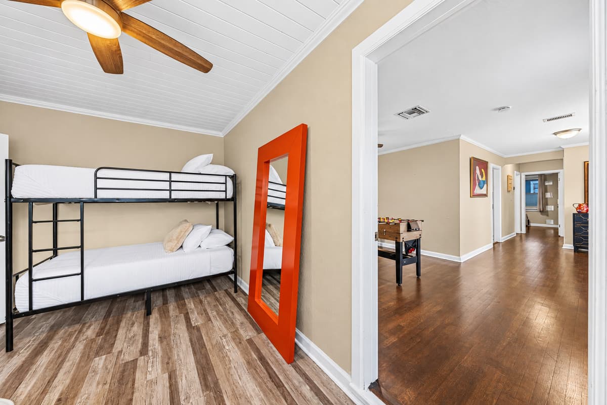 Open sleeping area with bunk beds and easy access to main living spaces—great for groups.