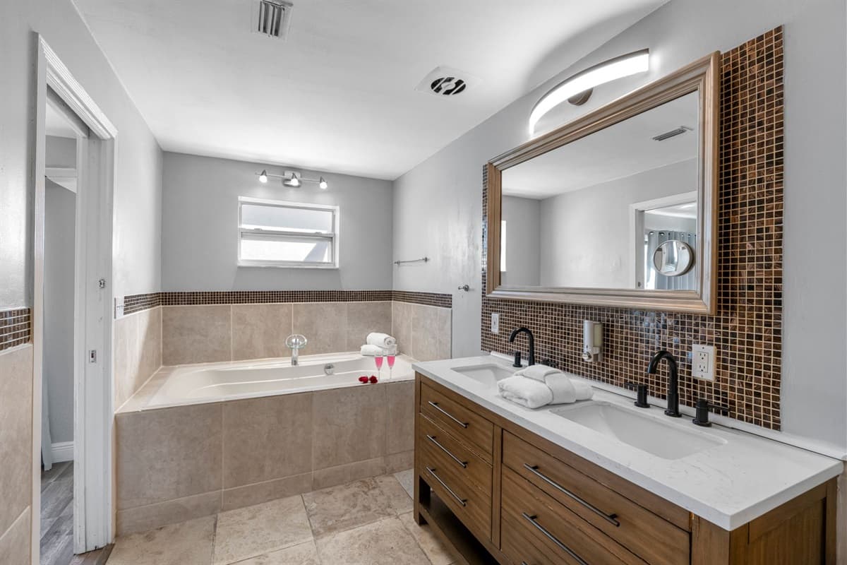Enjoy a spa-like ensuite with dual sinks and a deep soaking tub.