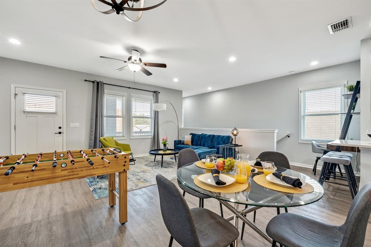 The attention to detail extends beyond the table, with subtle decor elements adding to the overall charm of the room.