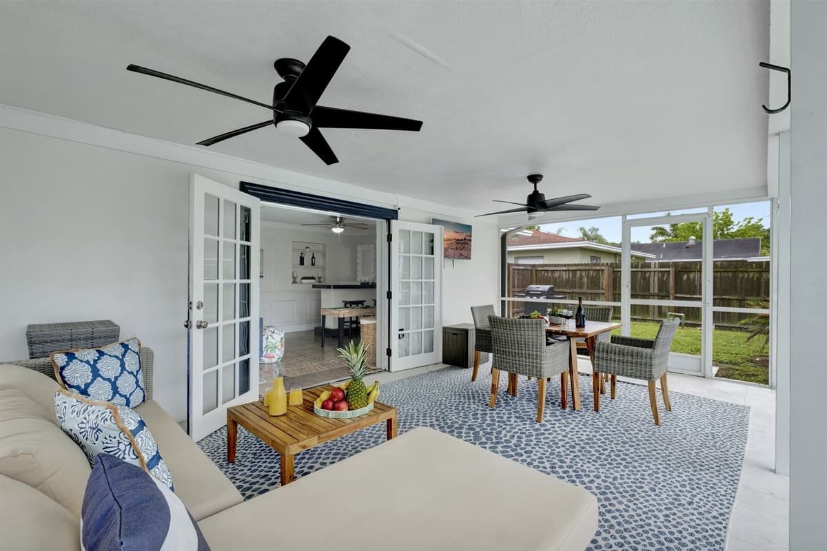 Whether you're seeking a serene retreat or a vibrant social hub, our covered common area by the pool, with its elegant comfy couch, promises the perfect blend of sophistication and relaxation.