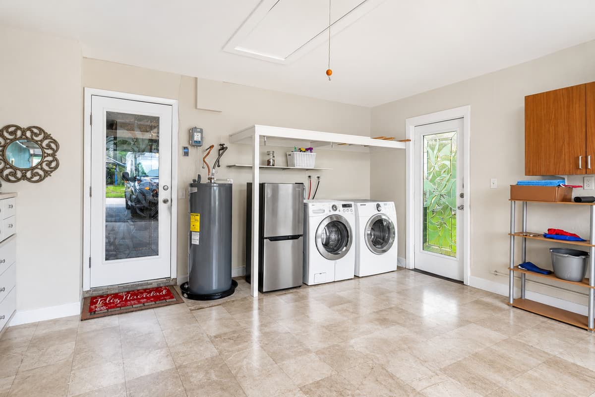 Dedicated laundry and storage area offering added convenience during your stay.