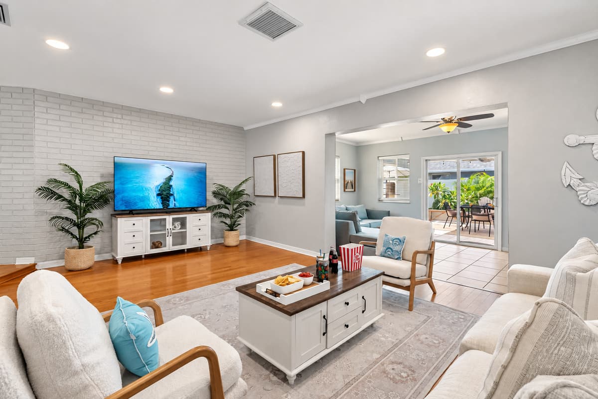 Designed with comfort in mind, this living room includes plenty of seating for the whole crew to gather, relax, and reconnect.