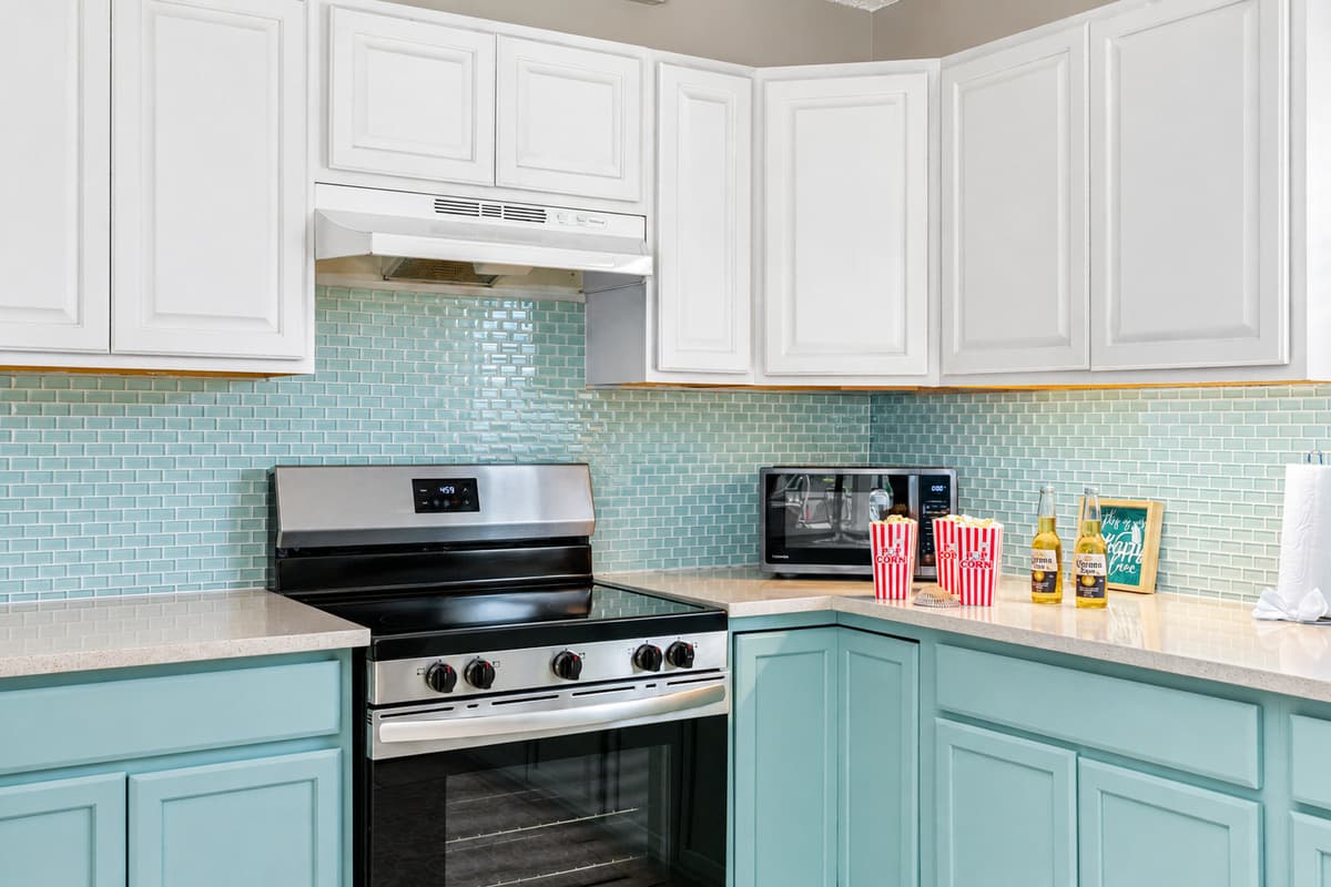 This spacious, fully-equipped kitchen combines stylish design with everyday functionality—perfect for everything from a sunrise coffee routine to a full family dinner after a day exploring.