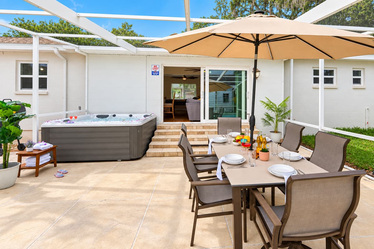 Cozy and private, this hot tub area is ideal for relaxing under the Florida sky.