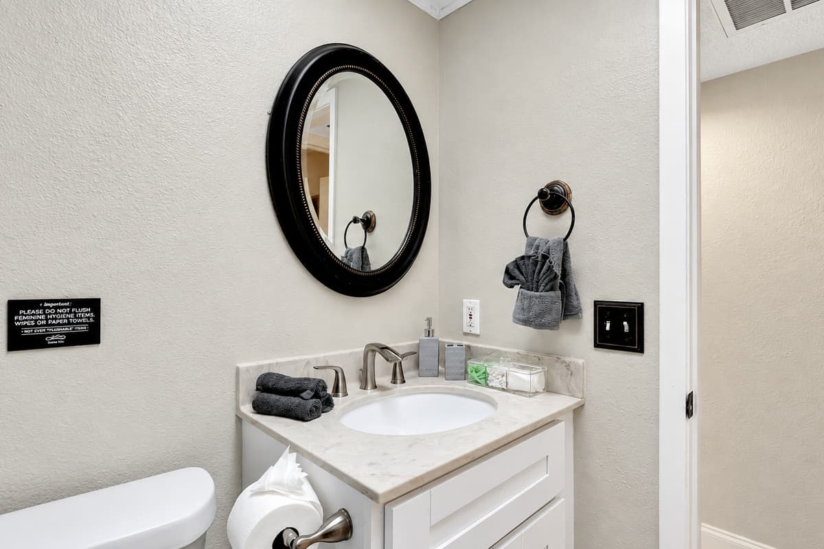 This chic and inviting space is a haven of relaxation and sophistication, beckoning you to indulge in a sanctuary designed for unparalleled comfort.