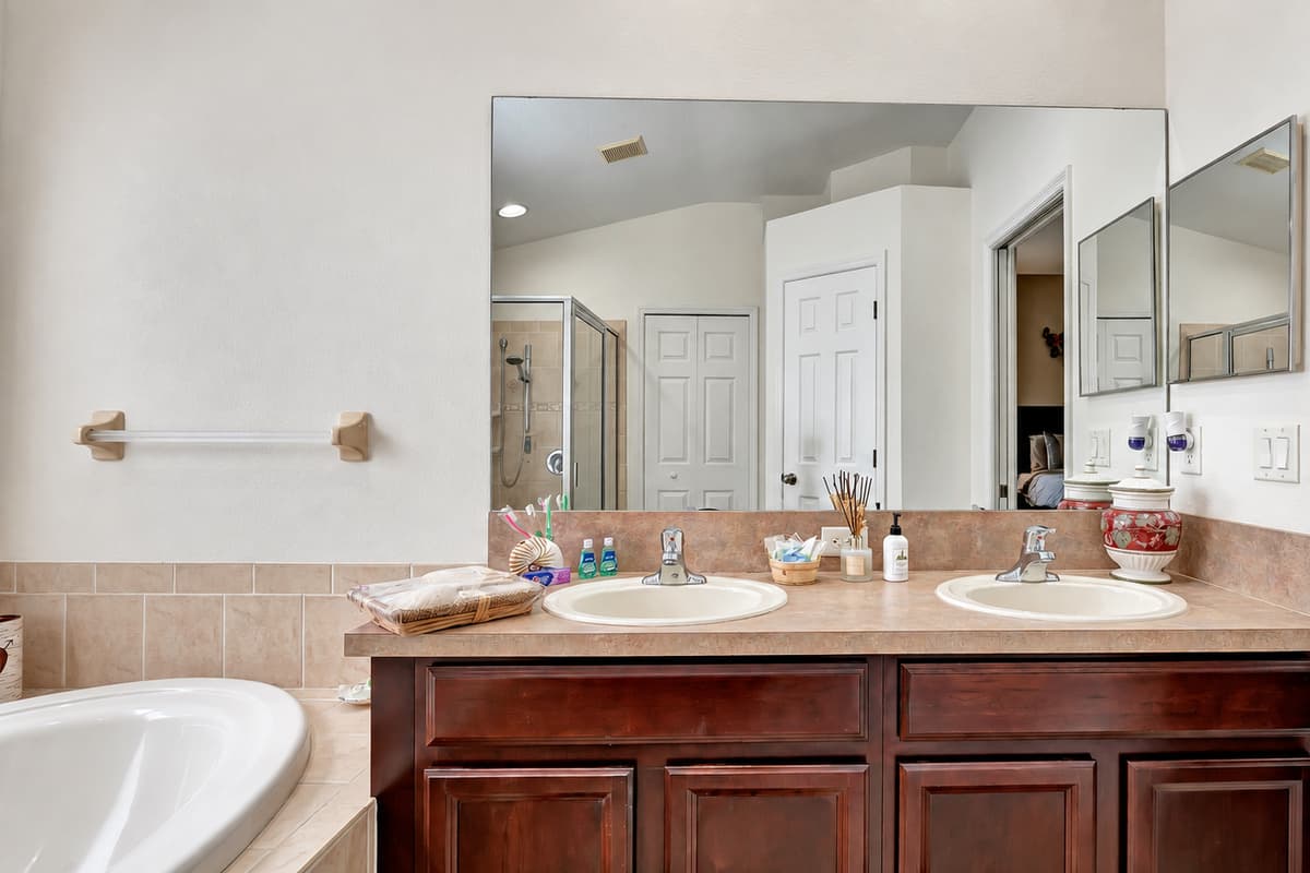 The vanity area is not just a place to get ready; it's a work of art.