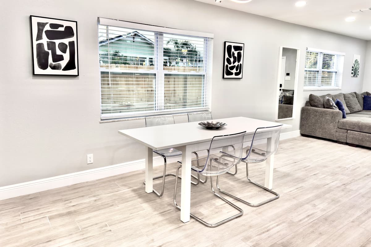 For added convenience, the open floor plan allows for seamless interaction between the kitchen, dining, and living areas.