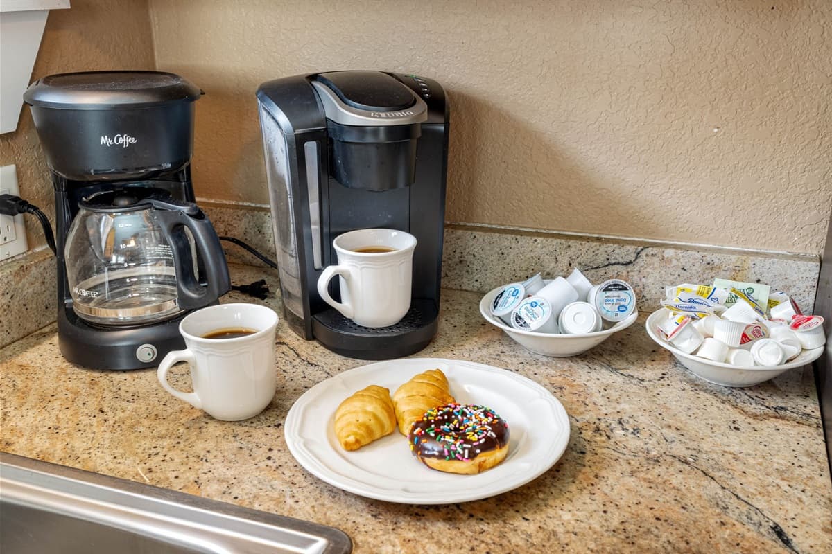 A convenient coffee maker and toaster are also at your disposal, ensuring that every meal or snack is easy to prepare.