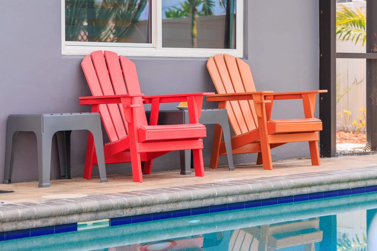 Screened-in pool and outdoor lounge space.