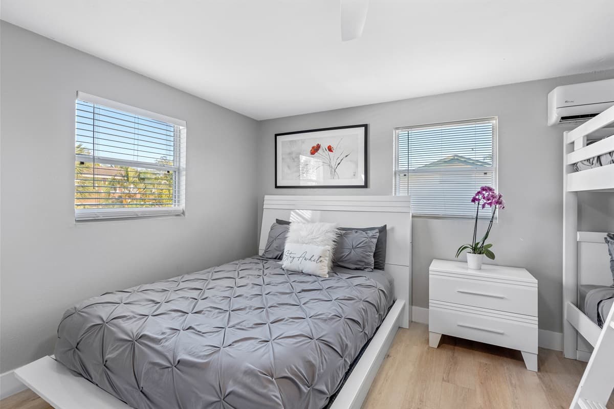 Spacious bedroom with queen sized bed, smart TV, drawers for storage. This bedroom will surely make your stay in this property the best among others.