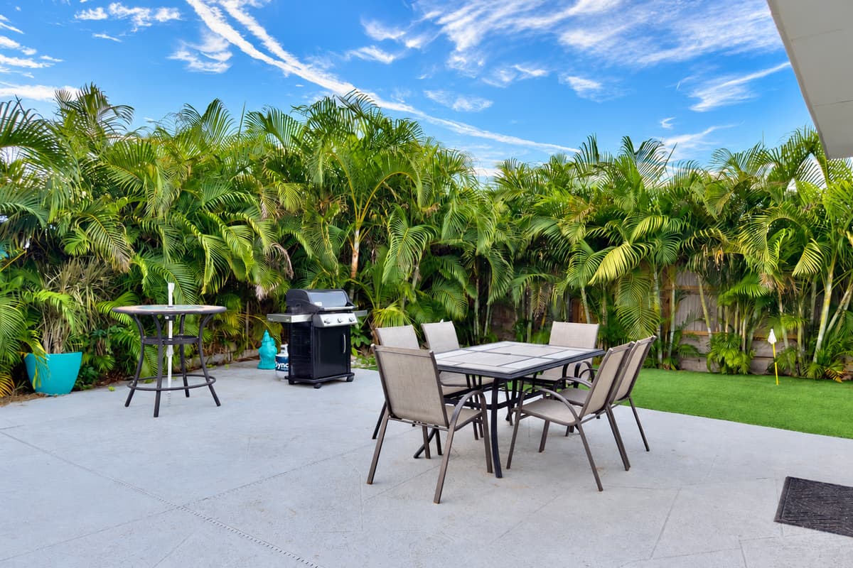 This backyard transforms every moment into vacation mode—from lounging to grilling.