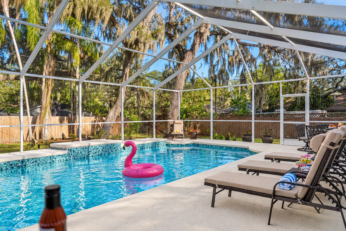 Enjoy your own private, screened-in pool oasis—perfect for swimming, lounging, and soaking up the Florida sunshine.
