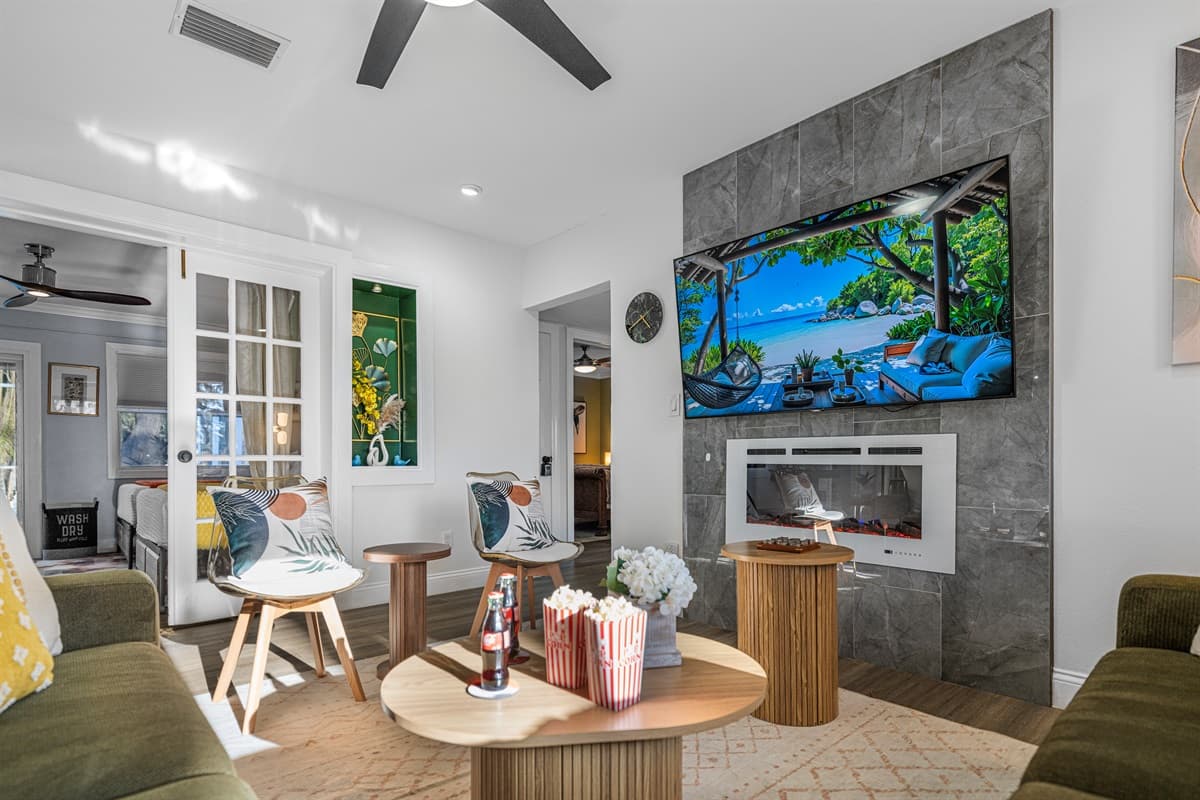 The living room is thoughtfully designed with elegant décor, soft lighting, and comfortable seating that creates a calm yet upscale atmosphere.
